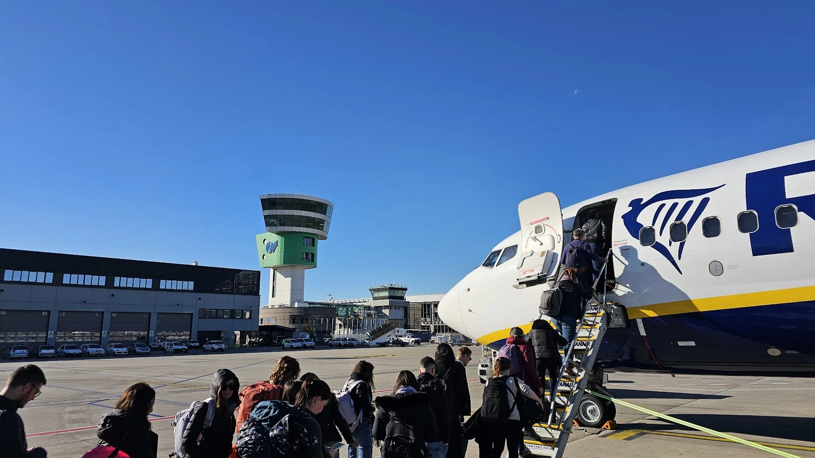 Bergamo Orio al Serio Airport terminal pickup zone for car rental in Lombardy