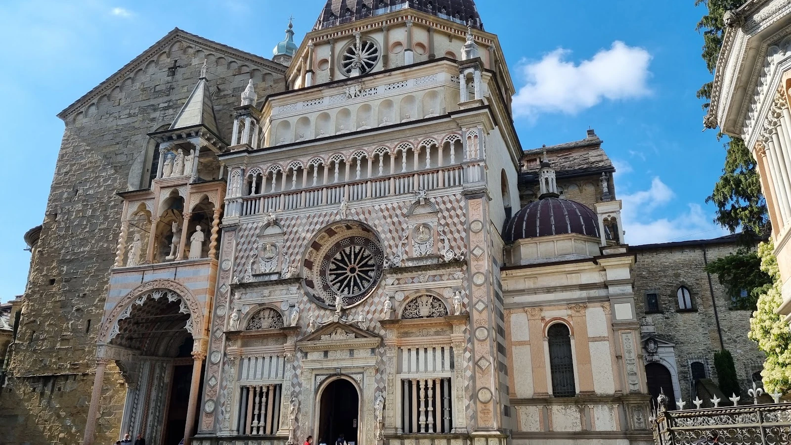 Interior of Basilica di Santa Maria Maggiore Bergamo showing elaborate tapestries and Baroque ceiling